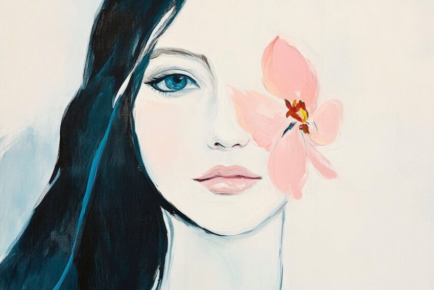Feminines Porträt mit blühender Blüte