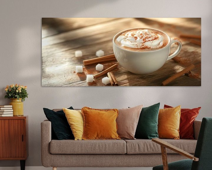 Kaffeetasse mit Sahne und Zimtstangen